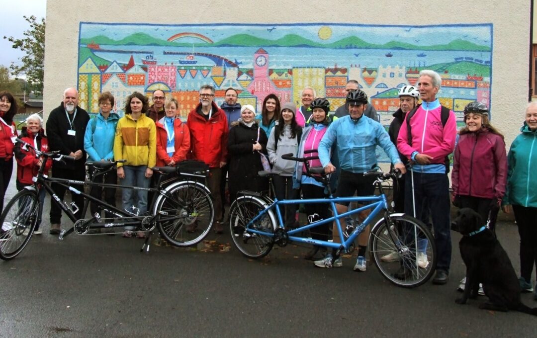 Group of cyclists with tandem bikes