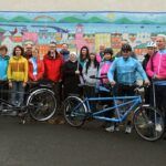 Group of cyclists with tandem bikes