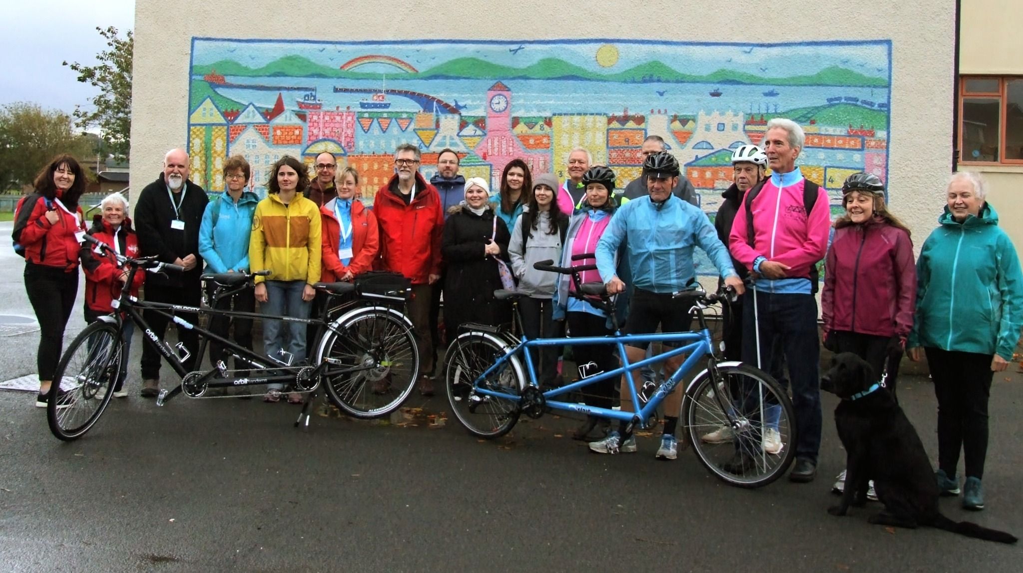 Group of cyclists with tandem bikes